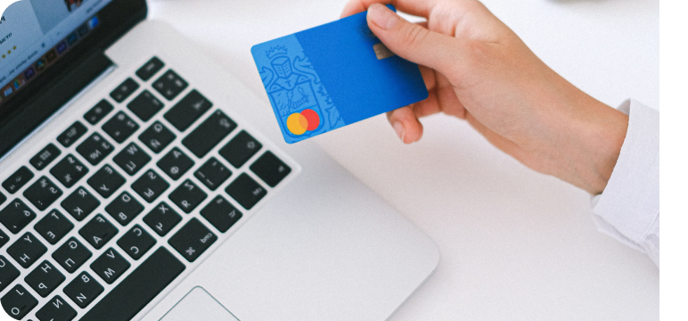 a person booking a hotel online using a credit card